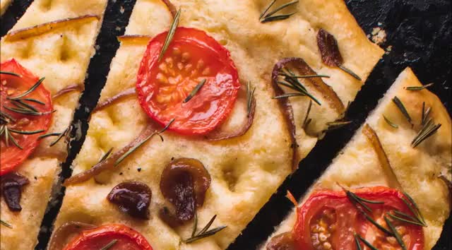 Focaccia With Caramelized Onions, Tomatoes And Rosemary
