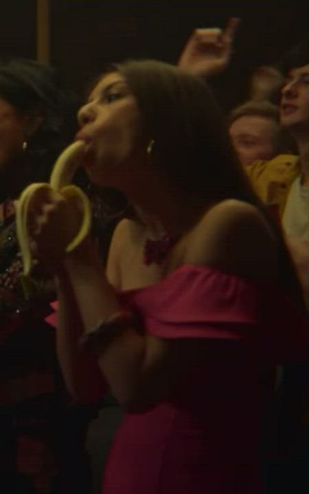 Mimi blowing a Banana