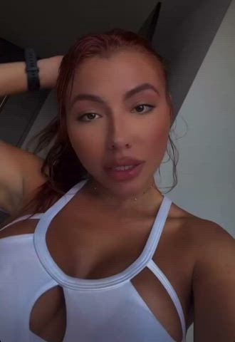 latina ponytail selfie gif