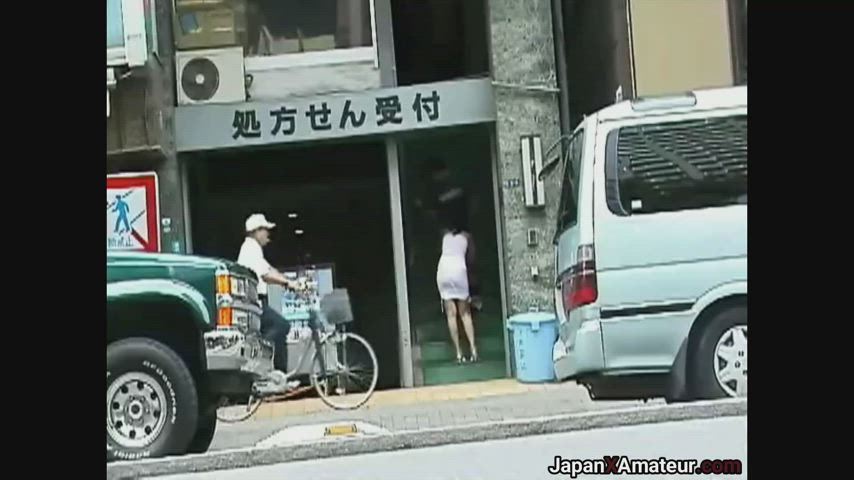 Japanese Girl Giving A Blowjob In Front Of A Building Entrance
