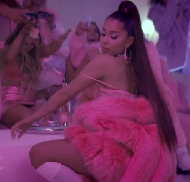 Ariana Grande twerking with her tongue out
