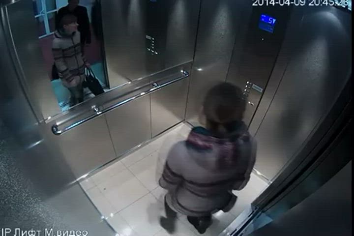 Girl squats and pees in lift with boyfriend watching