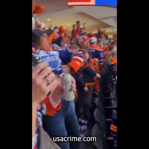 Edmonton Oilers fan flashes in the crowd 