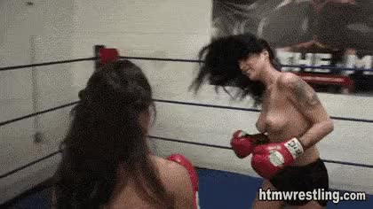 Females boxing in the ring ...