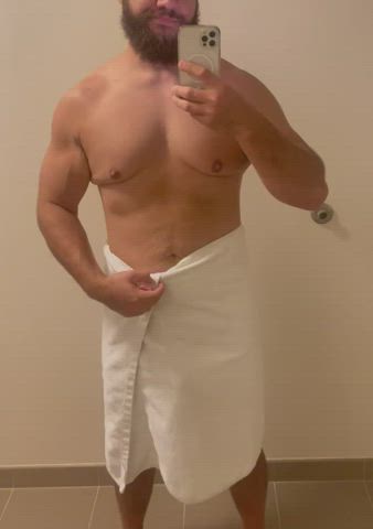 muscles striptease towel gif