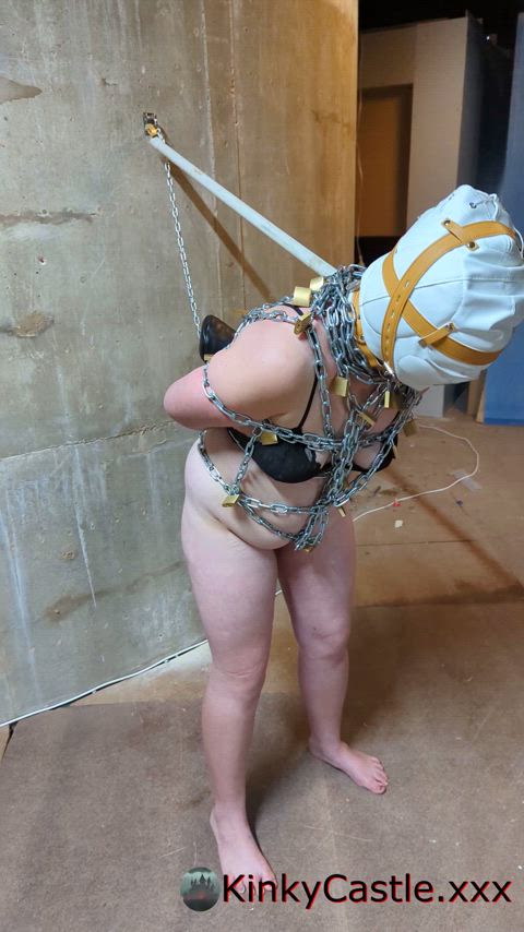 8kg of chain and 40 padlocks. Rigid leash means she can't even get close to the attachment