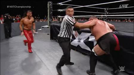 Samoa Joe low blow to Nakamura