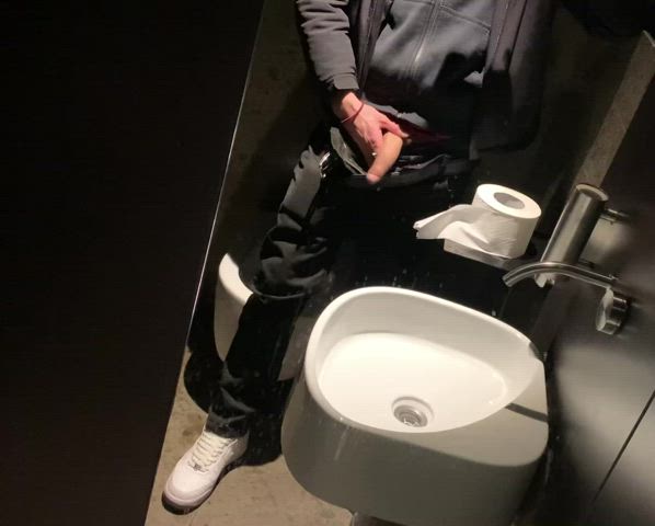 Flashing my big white cock in a public bathroom