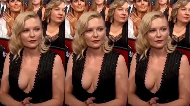 Kirsten Dunst Broad Smile & Deep Cleavage