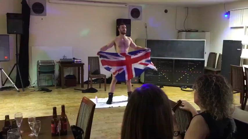 Male stripper shaking his huge cock for milfs.