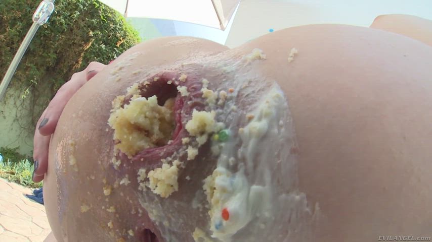 Casey Calvert pushing a cupcake out of her gaping shithole