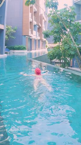 Showing off at the hotel pool