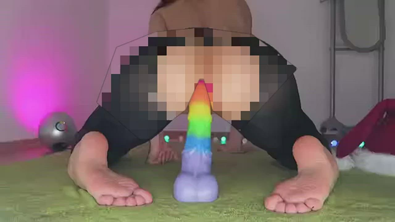 Riding a Rainbow Dildo