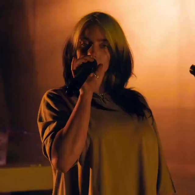 Even those wide shirts can't cover Billie Eilish's big tits