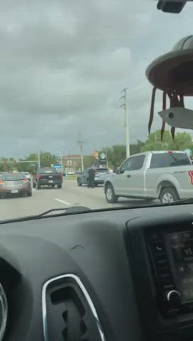 Jilling On The Top of a Car in Traffic