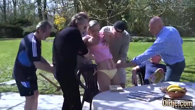 Sexy blonde gets man-handled by a group of geriatrics