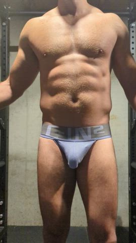 gym jock muscles gif