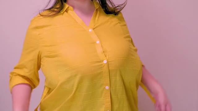 Bursting out of yellow top - Hirari Baknew