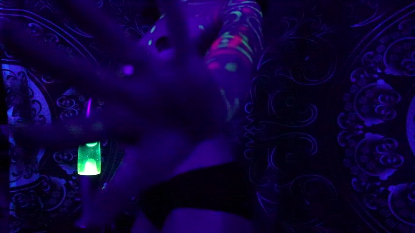 Neon glow dancing under a blacklight