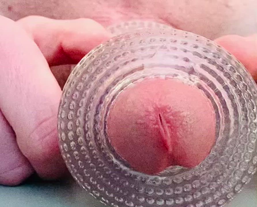 Close-up cock head cumshot