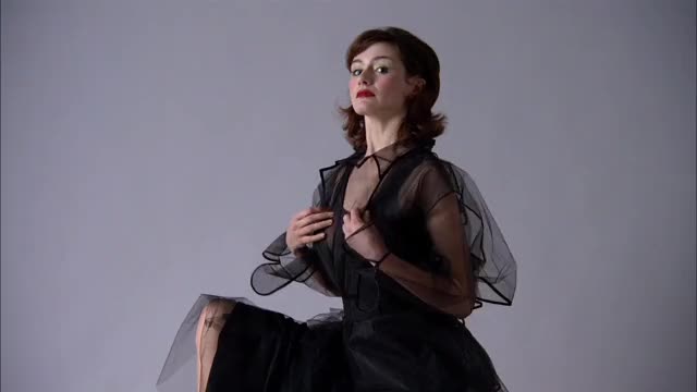 Emily Mortimer - Lovely & Amazing - see-through fashion shoot scene (opens film)