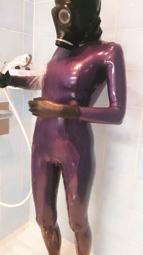 Enjoying a shower in full latex!