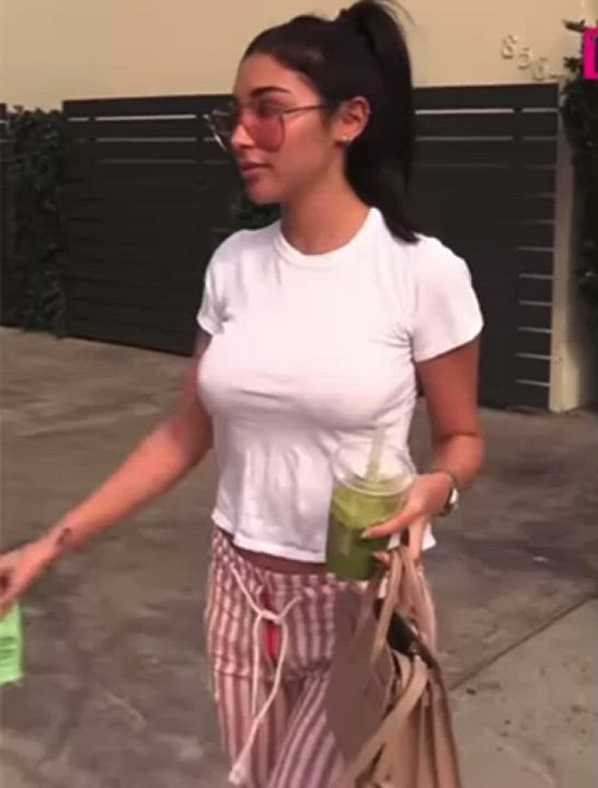braless in a white shirt