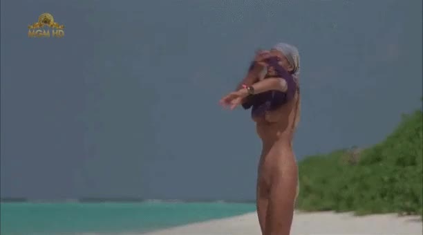 Bo Derek putting her shirt on for once