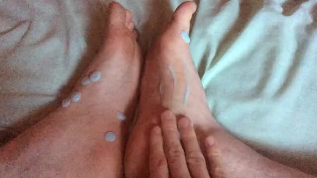 Rubbing lotion in my feet