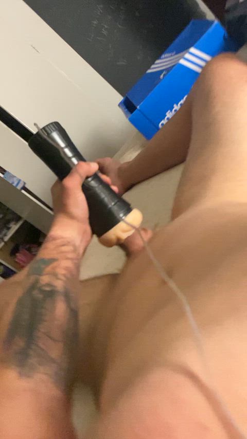 tattooed amateur jerking with fleshlight to explosive cumshot