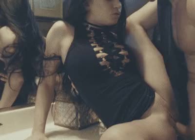 Fully clothed brunette [gif]