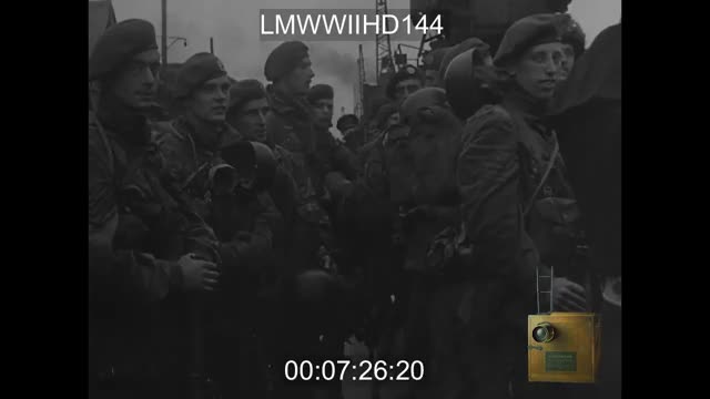 British paratroopers show off captured helmets