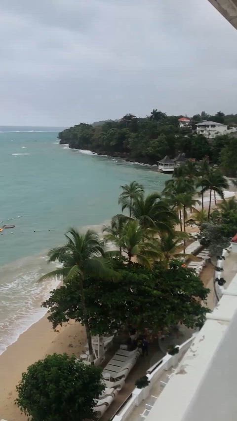 Katherine masturbating and fucking on our balcony in Jamaica. The next day our neighbors