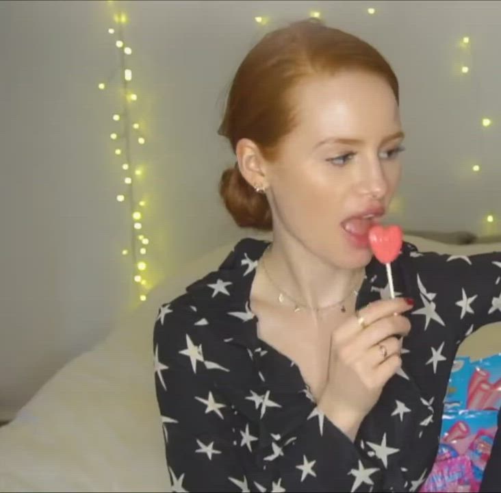 Madi eating a lollipop