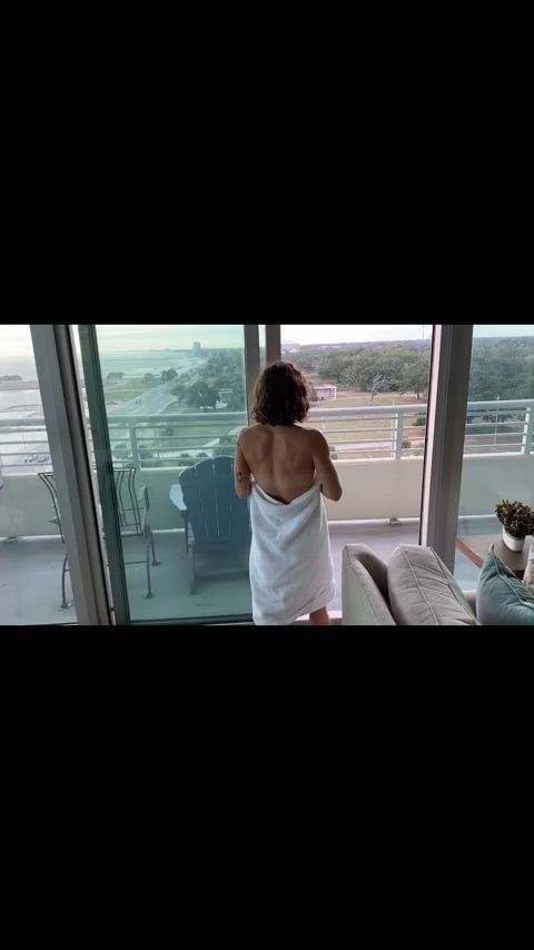 Nude on a balcony
