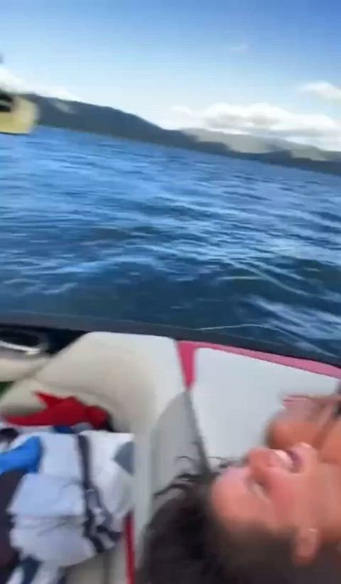 Couple having so much fun on the boat