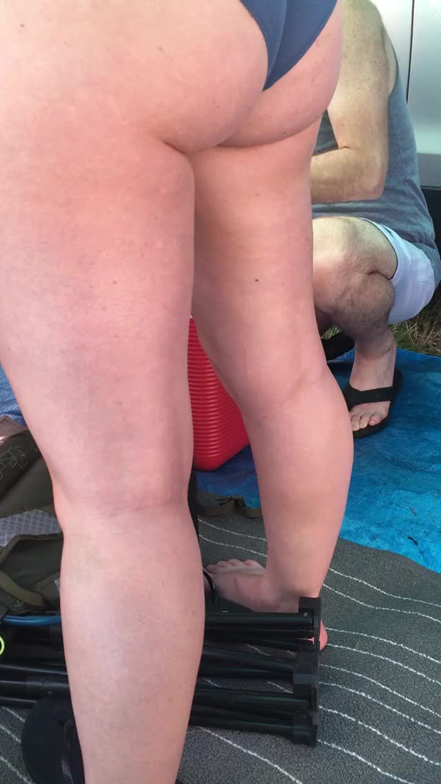 Teasing boyfriend and friends at campsite