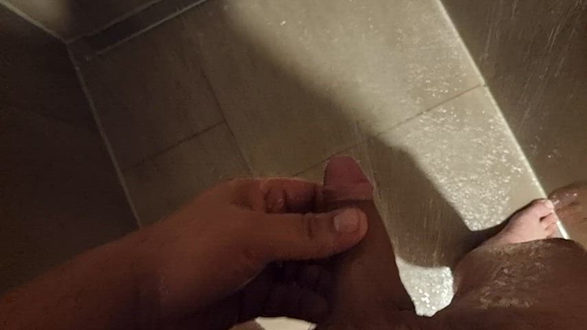Pissing in the public shower at the gym after a long workout