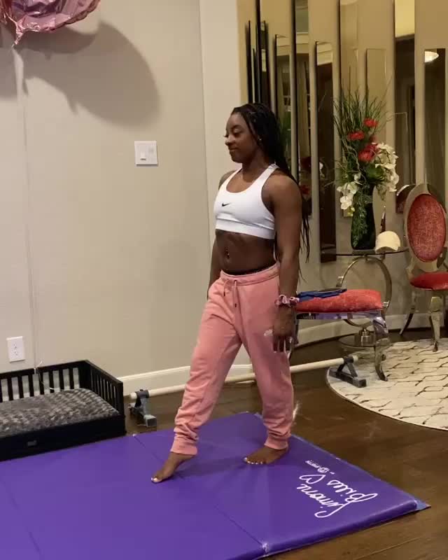 Simone Biles taking her pants off