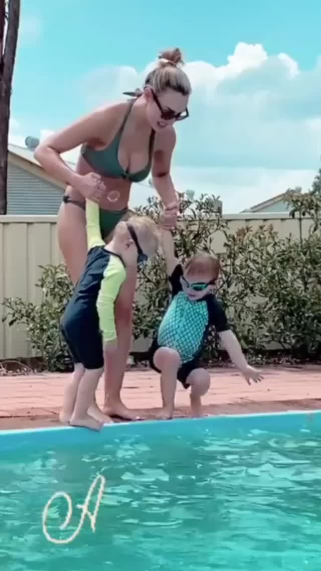 By the pool with her nephews