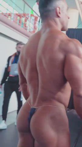 bodybuilder exposed gay public thong gif