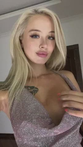 blonde boobs dress nipple piercing tattoo undressing gif