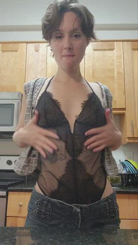 Reveal under black lace; do you like my vest?