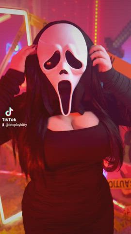 brunette cleavage clothed cosplay costume dancing girls mask women gif