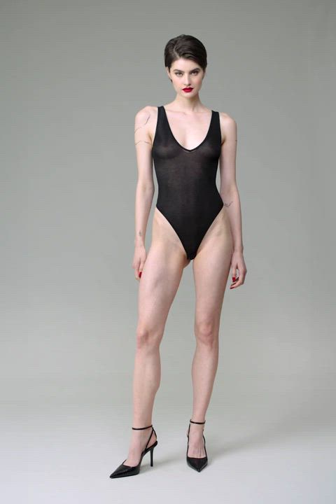 Anastasia Jovanovic in La Femme Amazone black v-neck thong bodysuit, by Maison Close