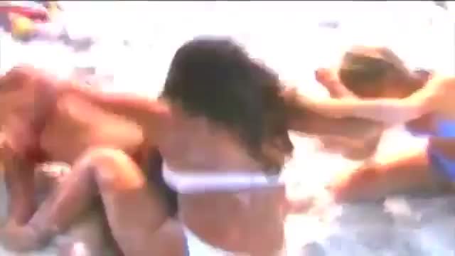 Spank fight on the beach