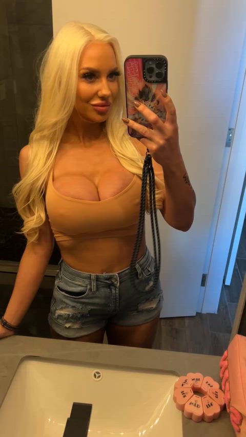 big tits bimbo blonde cleavage fake tits huge tits jean shorts onlyfans tank top