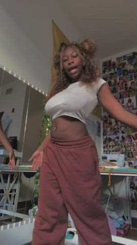 braless dancing ebony jiggling pierced pokies gif